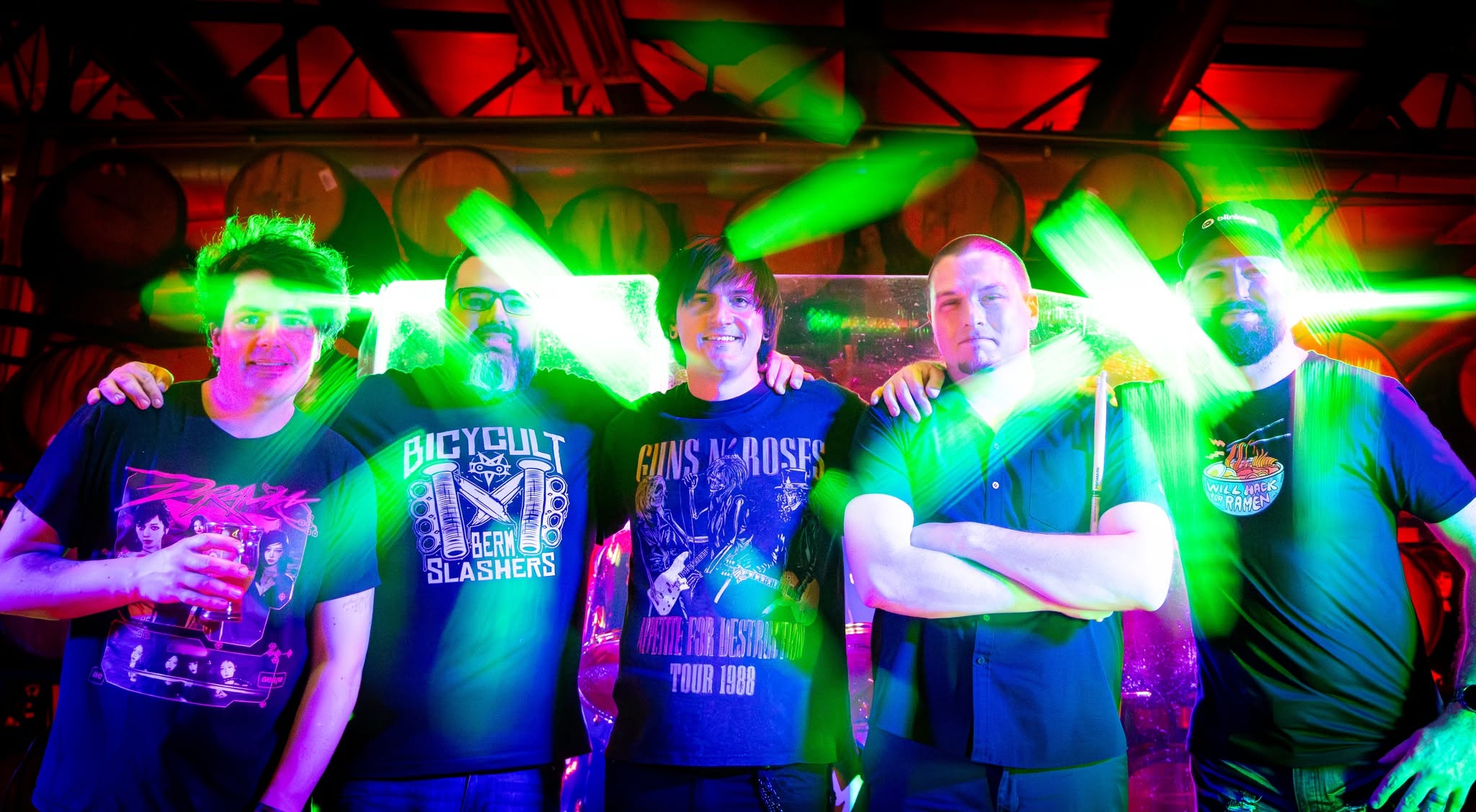All five members of Random Riot together after a show