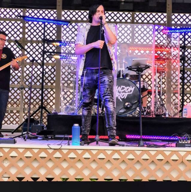 Singer at the mic on the pavilion stage at Mole Lake Casino, Crandon